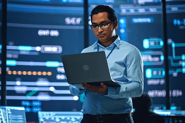 IT worker on computer